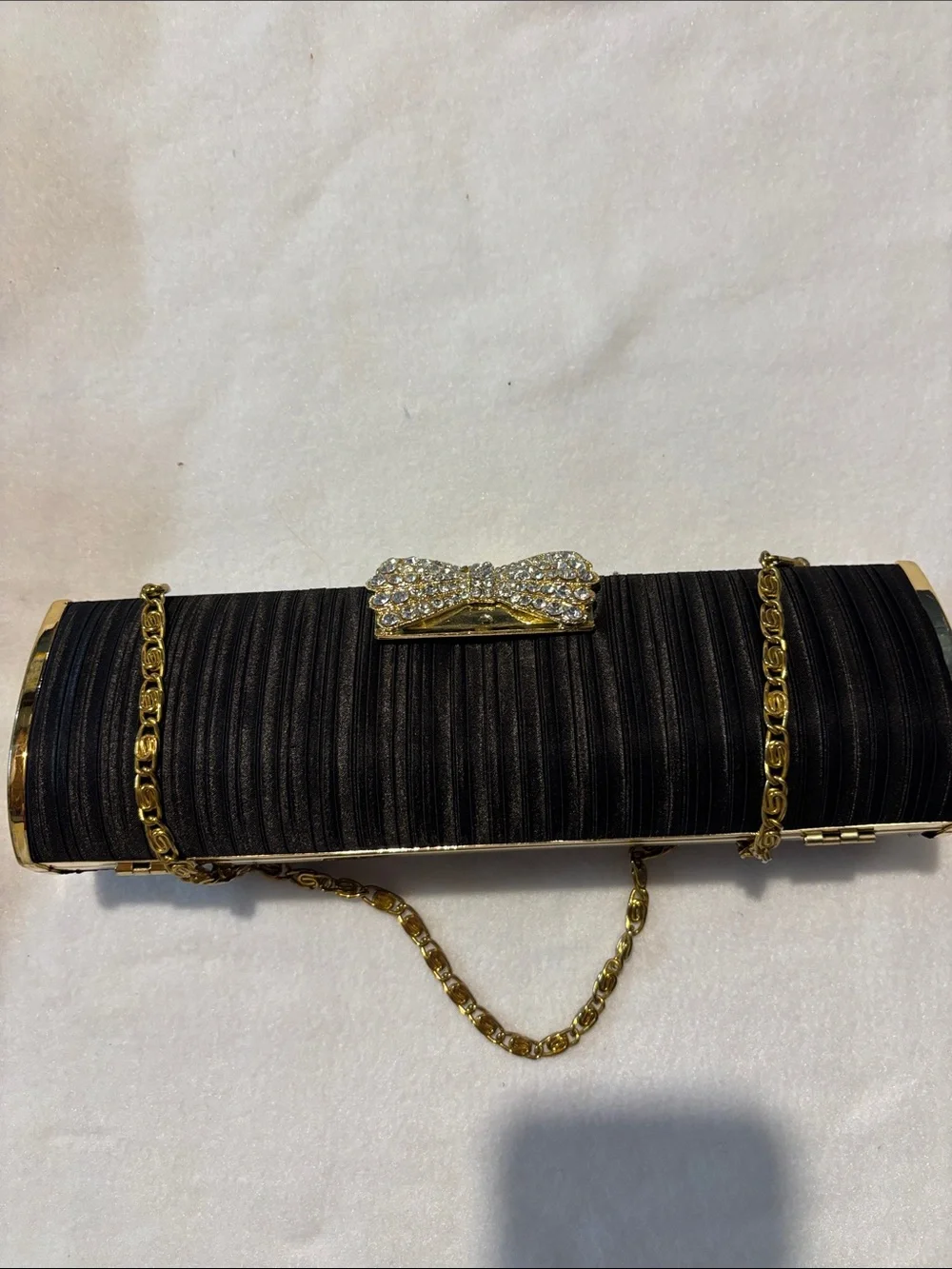 Black Evening Clutch with Gold Chain and Bow Accent